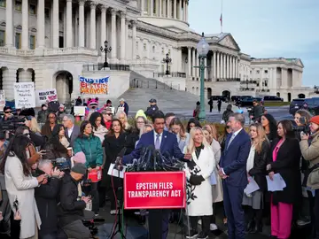 Congress Epstein From left, Rep. Ro Khanna, D-Calif., at podium, Rep. Marjorie Taylor-Greene, R-Ga., and Rep. Thomas Massie, R-Ky., speak during a news conference as the House prepares to vote on the Epstein Files Transparency Act, at the Capitol in Washington, Tuesday, Nov. 18, 2025. They are joined by survivors and family members who recounted their personal stories of Epstein. (AP Photo/J. Scott Applewhite)