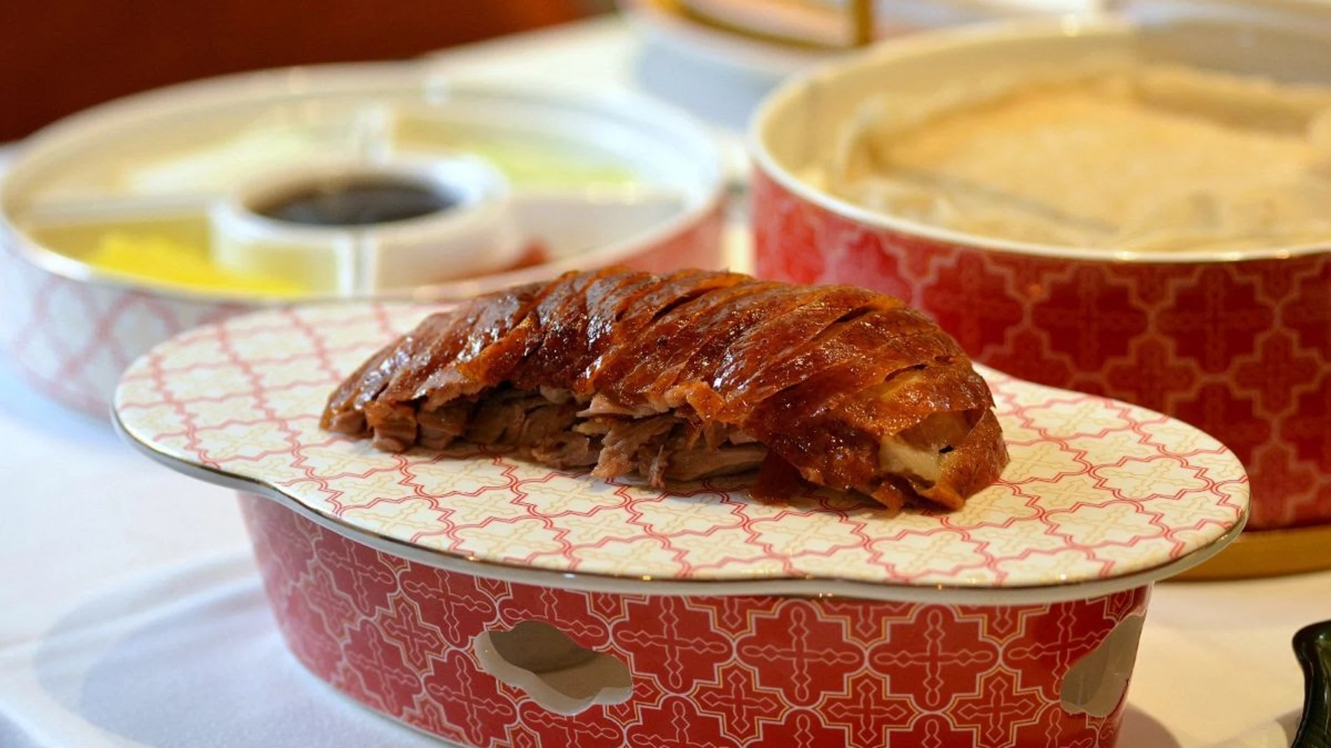 El regreso de Hutong, el restaurante de alta cocina china en Madrid, donde comer un sublime pato laqueado y estrenar una barra de dim sum