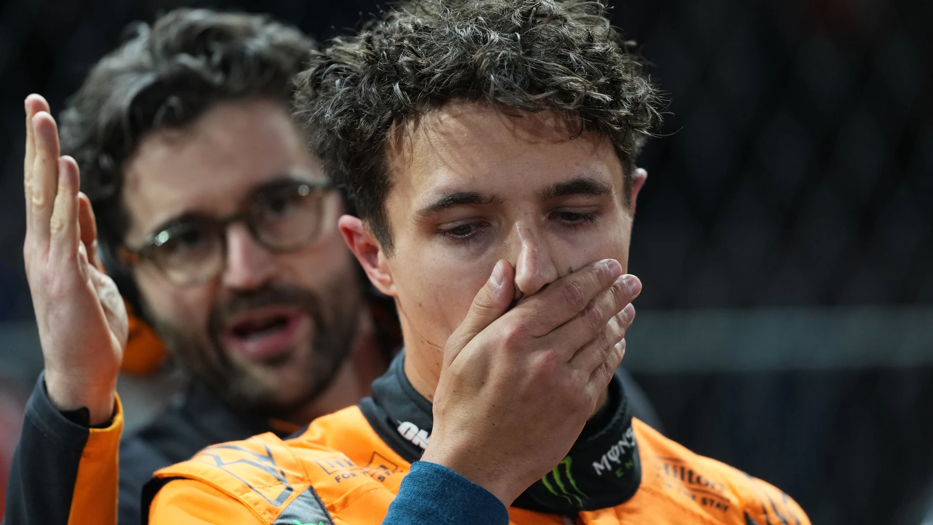 McLaren driver Lando Norris of Great Britain stands near his car on the grid before the Formula One U.S. Grand Prix auto race in Las Vegas, Saturday, Nov. 22, 2025. (AP Photo/Eric Gay)