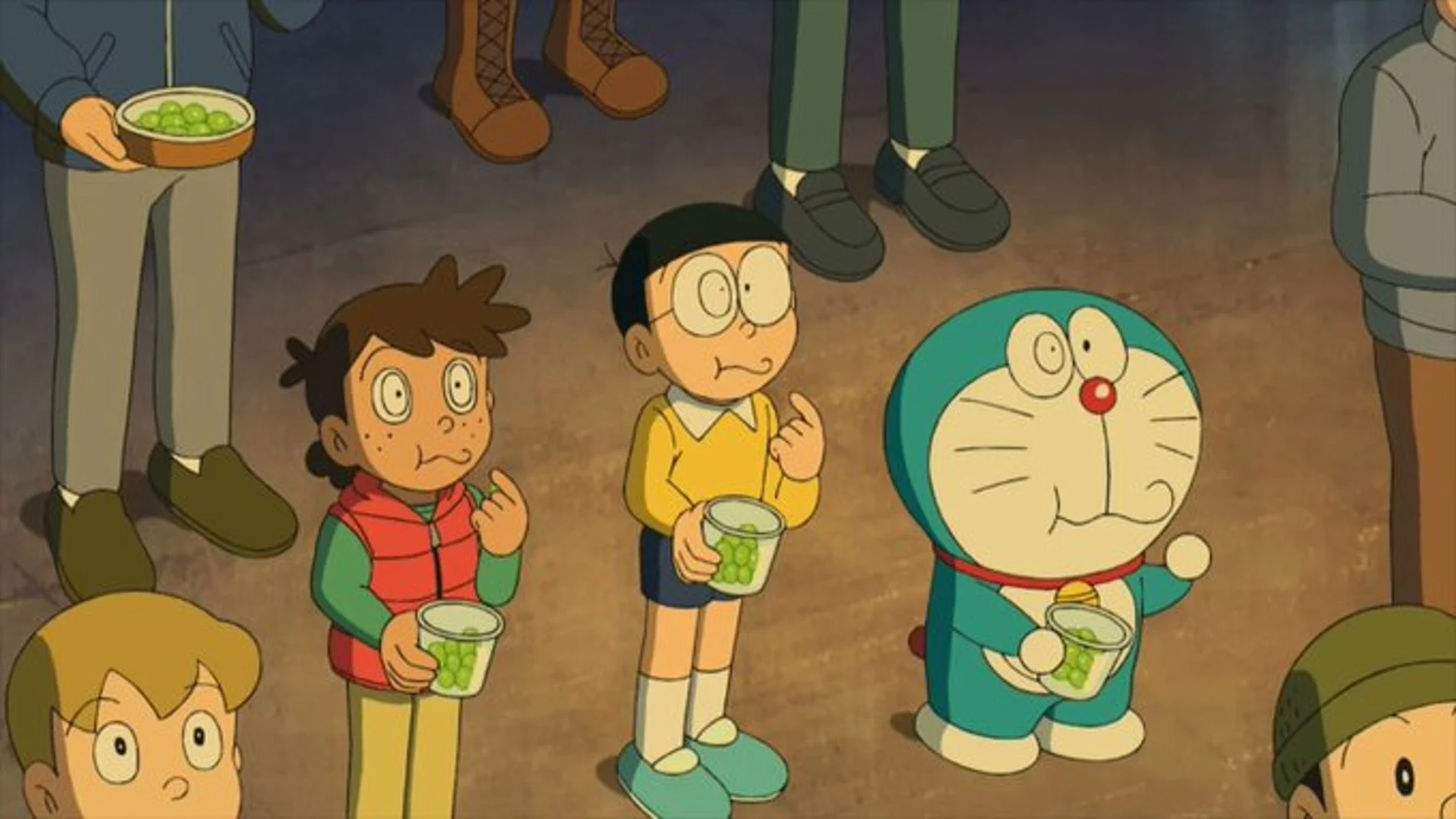 Doraemon y Nobita tomándose las uvas en la Puerta del Sol de Madrid, España