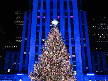 2025 Rockefeller Center Christmas Tree Lighting IMAGE DISTRIBUTED FOR TISHMAN SPEYER - The 2025 Rockefeller Center Christmas Tree is lit for the season on Wednesday, Dec. 3, 2025 in New York. The 75-foot tall, 11-ton Norway Spruce from East Greenbush, NY, is decorated with 57,350 multi-colored, energy-efficient LED lights and a Swarovski crystal star. (Diane Bondareff/AP Content Services for Tishman Speyer)