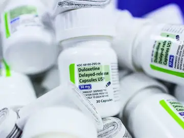 Botes del antidepresivo duloxetina, recetado para tratar la depresión y la ansiedad Botes del antidepresivo duloxetina, recetado para tratar la depresión y la ansiedad