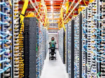 AWS Data Center IMAGE DISTRIBUTED FOR AWS - A technician works at an Amazon Web Services AI data center in New Carlisle, Ind., on Thursday, Oct. 2, 2025. (Noah Berger/Amazon Web Services via AP Images)