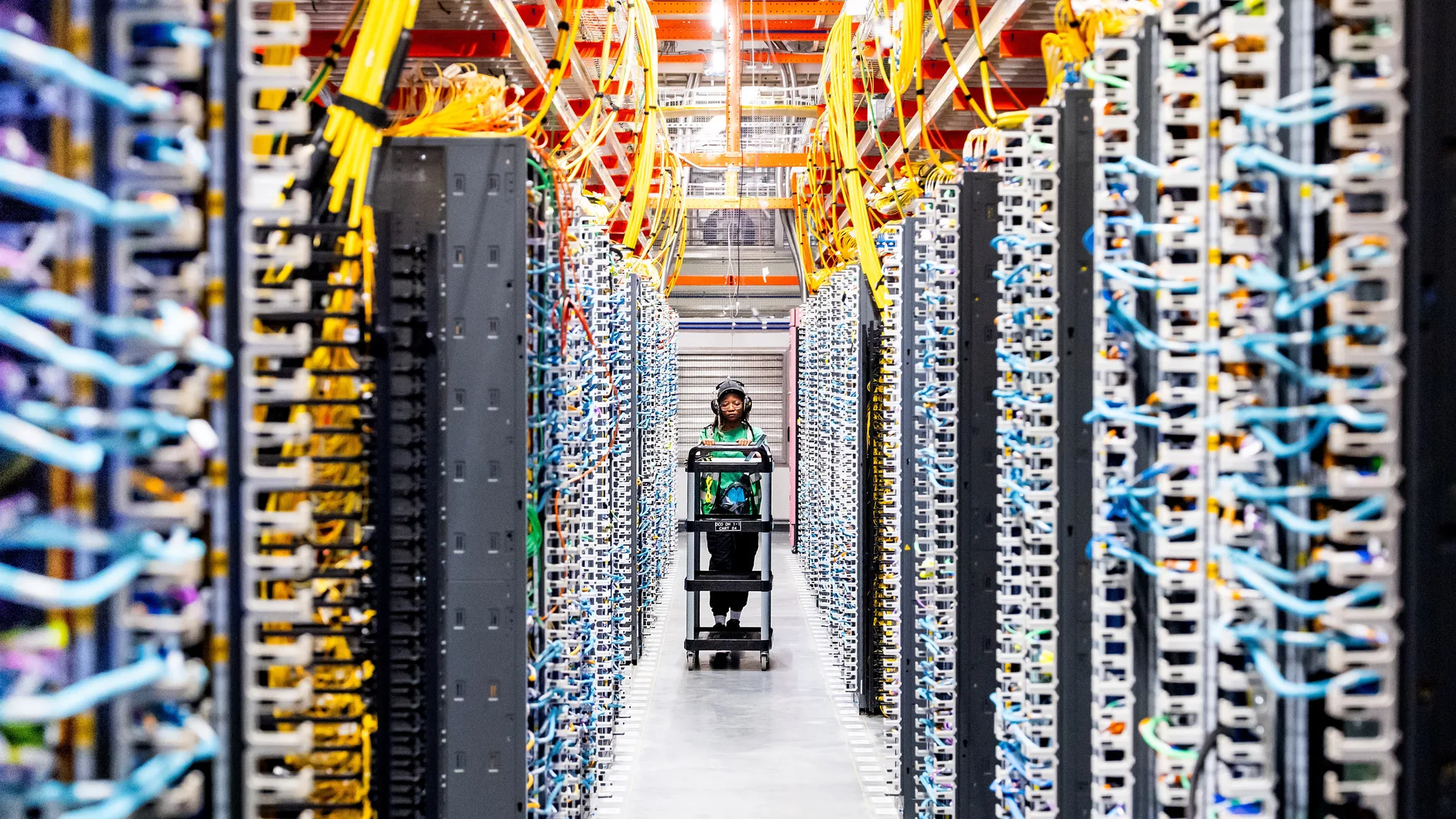 IMAGE DISTRIBUTED FOR AWS - A technician works at an Amazon Web Services AI data center in New Carlisle, Ind., on Thursday, Oct. 2, 2025. (Noah Berger/Amazon Web Services via AP Images)