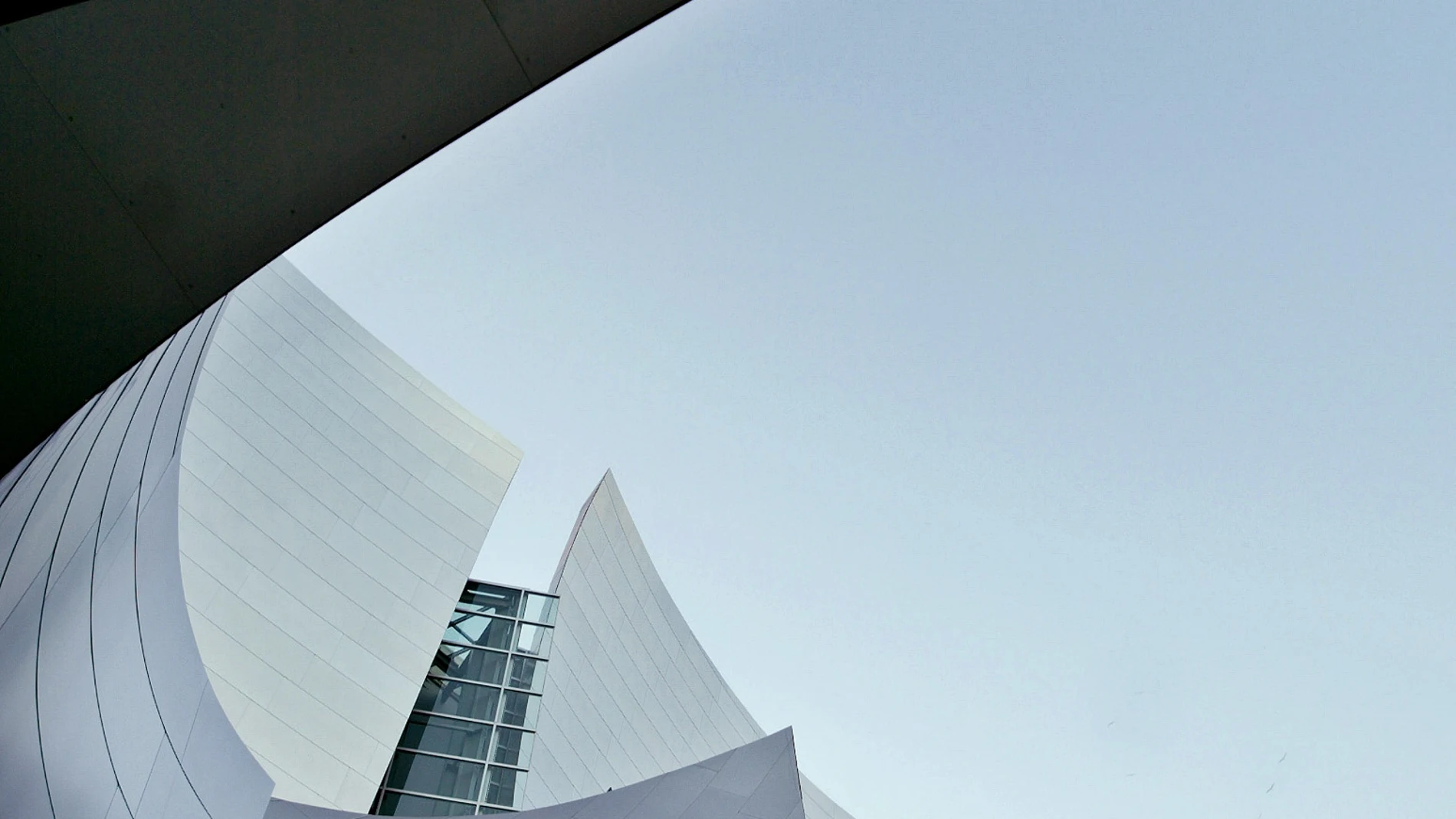 FILE - A view of the swoops of stainless-steel sheets that distinguish the new Walt Disney Concert Hall, designed by renowned architect Frank Gehry in downtown Los Angeles, Oct. 13, 2003. (AP Photo/Kevork Djansezian, File)