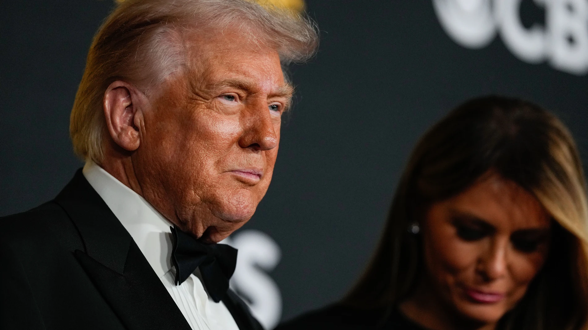 President Donald Trump and first lady Melania Trump walk the red carpet before the 48th Kennedy Center Honors, Sunday, Dec. 7, 2025, at the John F. Kennedy Center for the Performing Arts in Washington. (AP Photo/Julia Demaree Nikhinson)