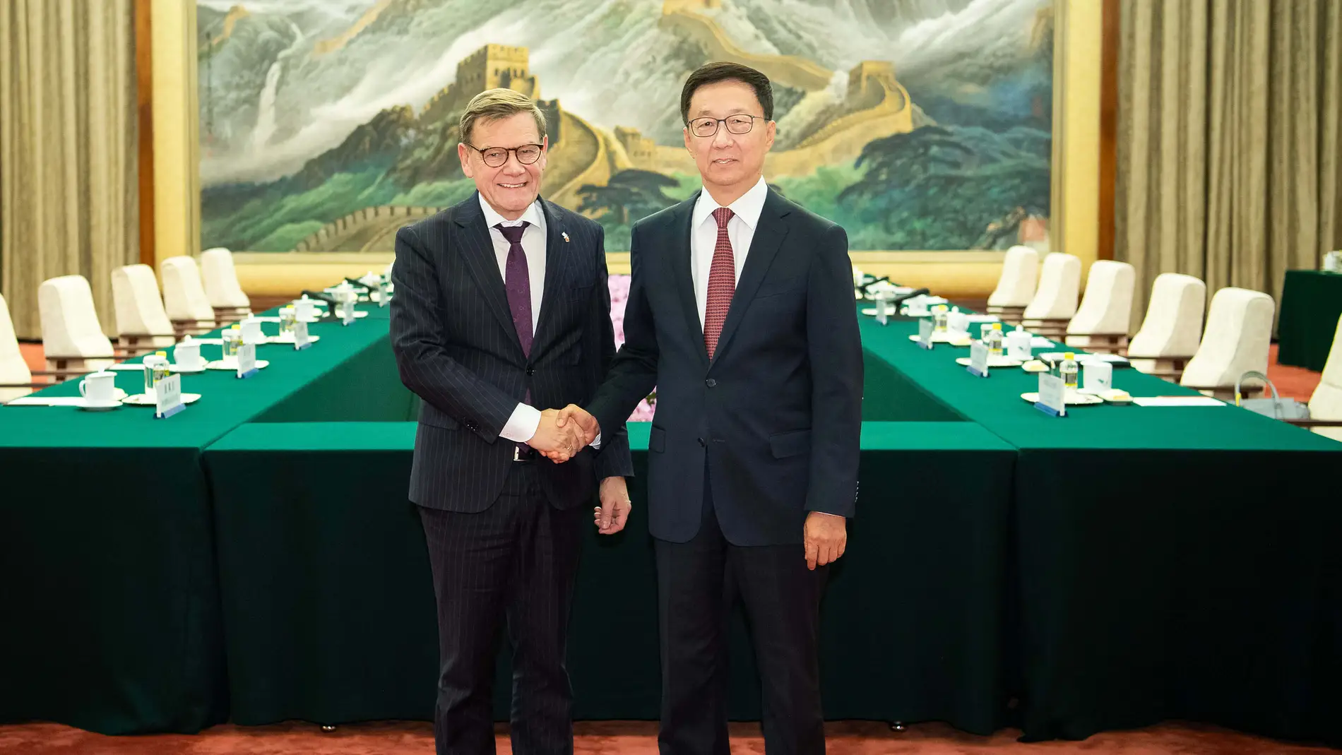 In this photo released by Xinhua News Agency, Chinese Vice President Han Zheng, right meets with visiting German Foreign Minister Johann Wadephul in Beijing on Monday, Dec. 8, 2025. (Li Tao/Xinhua via AP) NO SALES