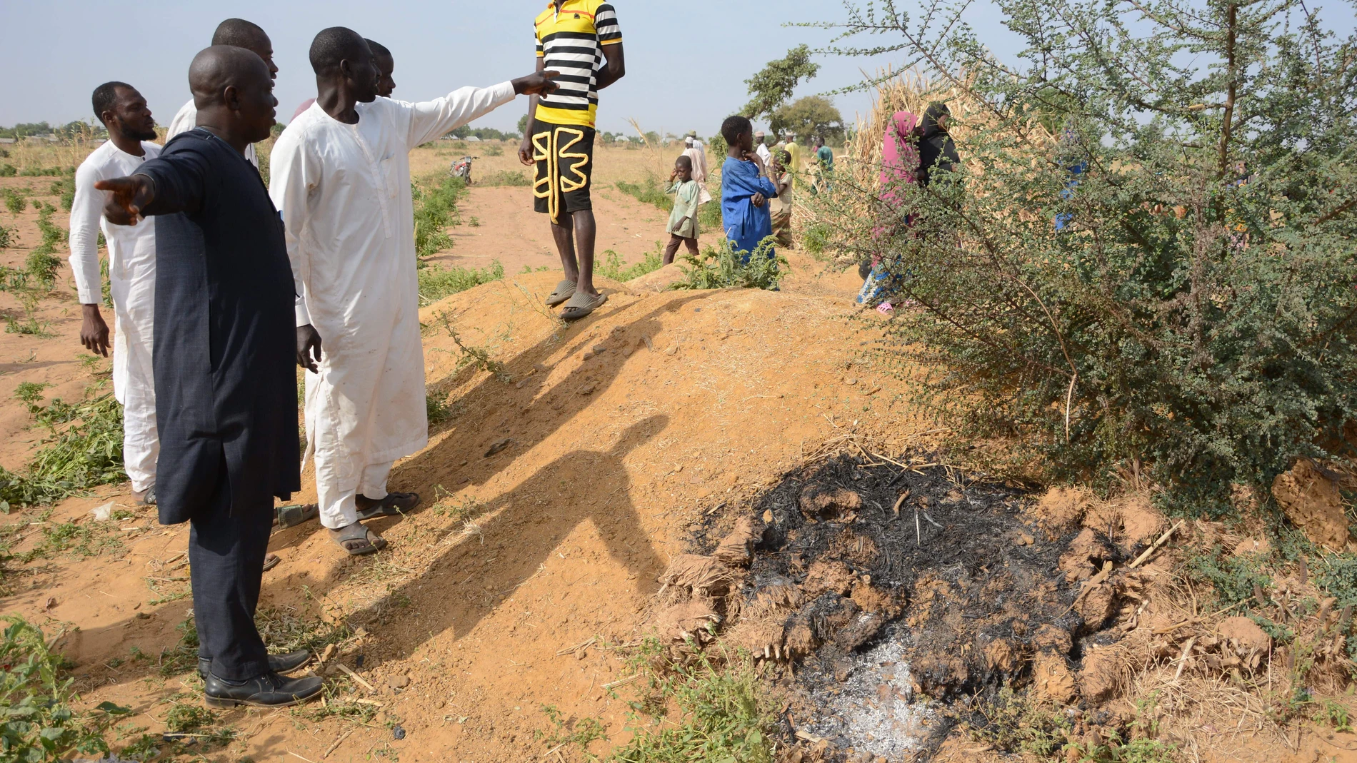 People visit the site of a U.S. airstrike in Northwest, Jabo, Nigeria, Friday, Dec. 26, 2025. (AP Photo/ Tunde Omolehin)