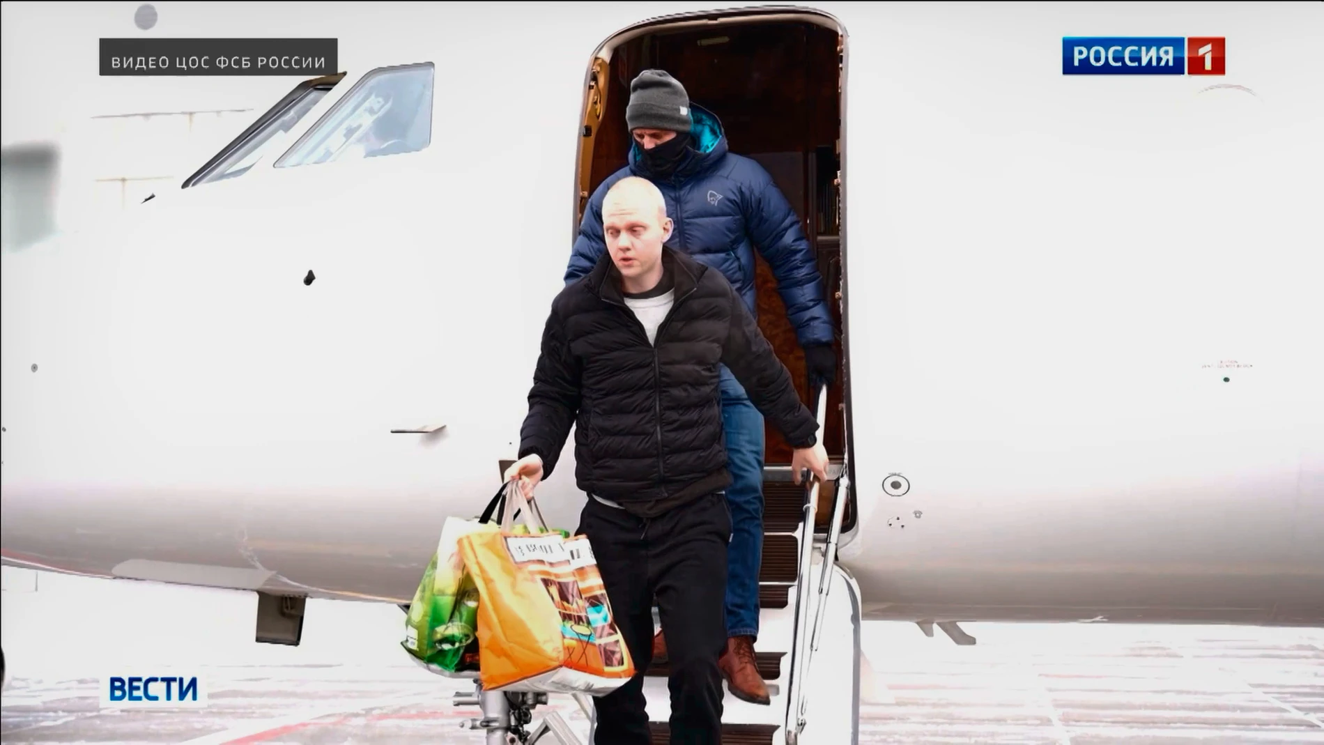 In this image, made from video and provided by Russian Federal Security Service via Russia-1 TV channel on Thursday, Jan. 8, 2026, Daniil Kasatkin, a Russian basketball player who was jailed in France and whose extradition was demanded by the United States, is seen after being released in a prisoner swap with France that saw the release of Laurent Vinatier, a French political scholar. (Russian Federal Security Service/Russia-1 TV channel via AP)