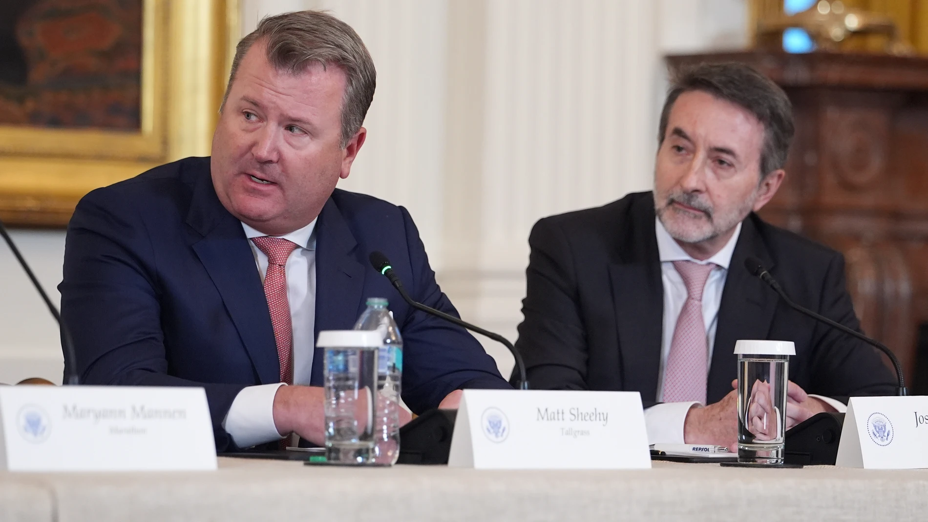 Matt Sheehy, president and CEO of Tallgrass Energy, speaks as Josu Jon Imaz, CEO of Repsol, listens, during a meeting with President Donald Trump and oil executives in the East Room of the White House, Friday, Jan. 9, 2026, in Washington. (AP Photo/Evan Vucci)