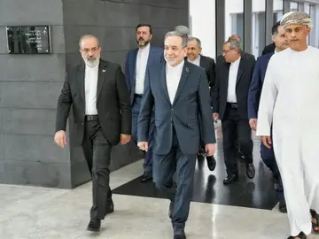 Iran-Nuclear Talks FILE - In this photo released by the Iranian Foreign Ministry, Iranian Foreign Minister Abbas Araghchi, center, heads to the venue for talks between Iran and the U.S., in Muscat, Oman, Friday, Feb. 6, 2026. (Iranian Foreign Ministry via AP, File)