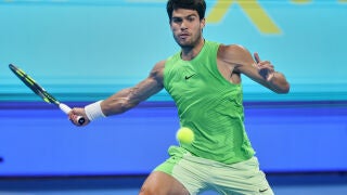 Spain's Carlos Alcaraz returns to Arthur Fils of France during the final of Qatar Open tennis in Doha, Qatar, Saturday Feb. 21, 2026. (AP Photo/Hussein Sayyed)