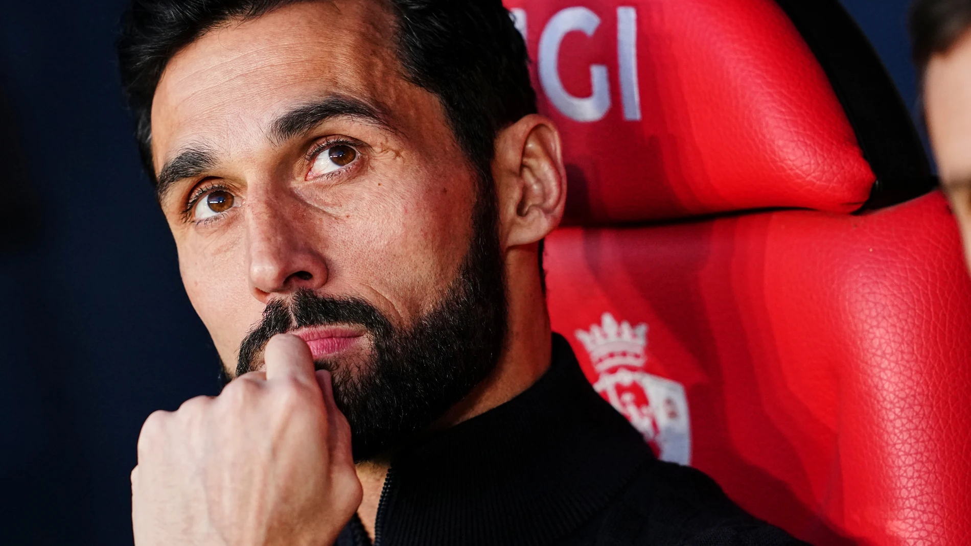 Real Madrid's head coach Alvaro Arbeloa sits on the bench prior the Spanish La Liga soccer match between Osasuna and Real Madrid in Pamplona, Spain, Saturday, Feb. 21, 2026. (AP Photo/Miguel Oses)