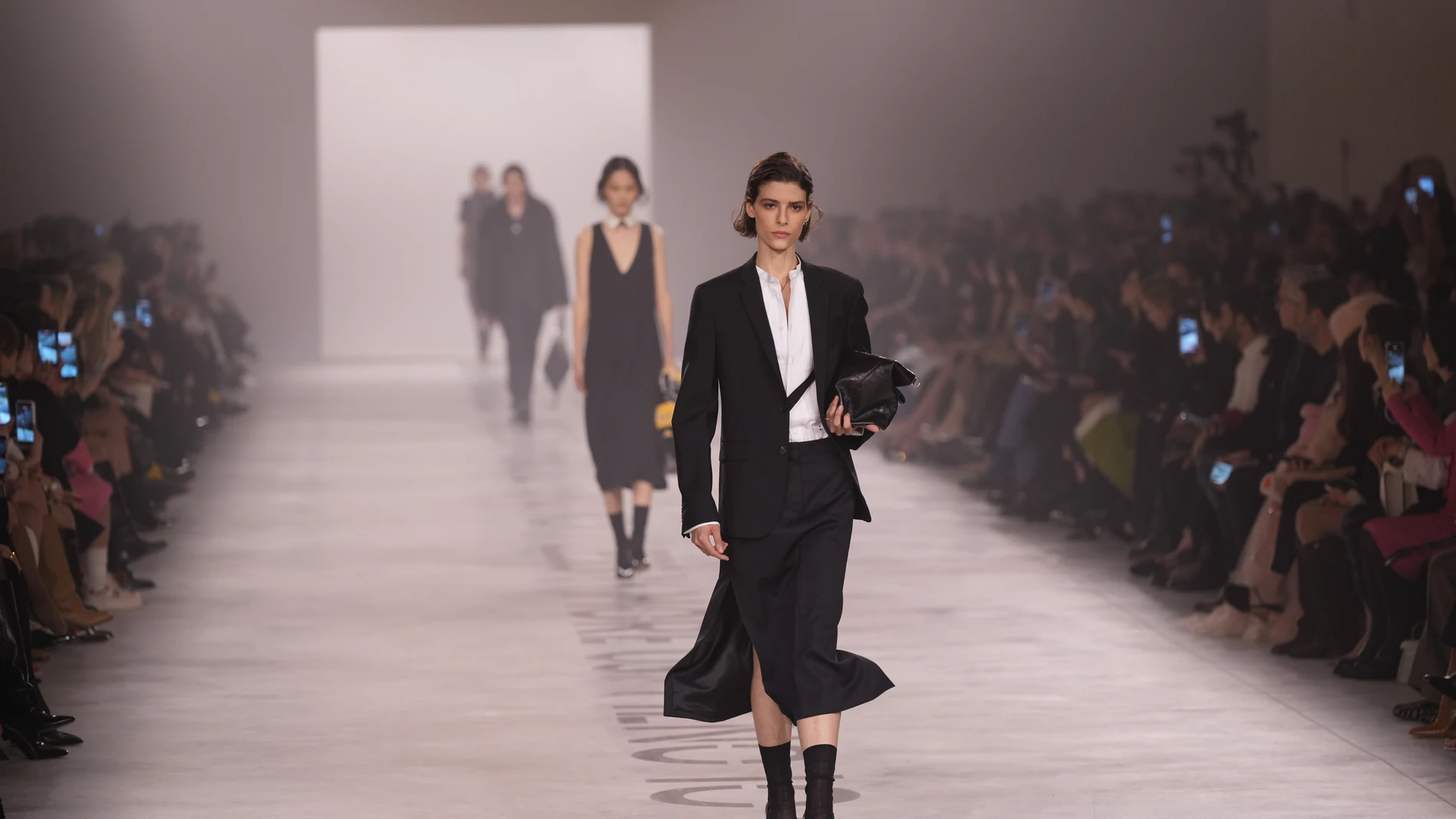 A model wears a creation from the Fendi Fall/Winter 2026-2027 Women's collection presented in Milan, Italy, Wednesday, Feb. 25, 2026. (AP Photo/Antonio Calanni)