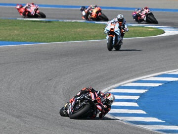 Italy's Marco Bezzecchi of Aprilia Racing is chased by the pack of riders during the MotoGP at the Chang International Circuit in Buriram, Thailand, Sunday, March 1, 2026. (AP Photo/Kittinun Rodsupan)