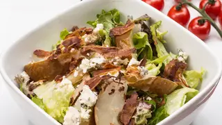 Imagen de archivo de ensalada césar Imagen de archivo de ensalada césar