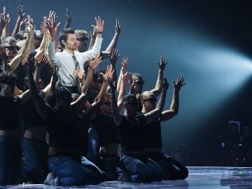 Harry Styles performs during the Brit Awards 2026 in Manchester, England, Saturday, Feb. 28, 2026. (Photo by Scott A Garfitt/Invision/AP)