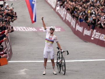Tadej Pogacar of Team UAE Emirates celebrates winning the Strade Bianche (White Roads), a 203 km one day cycling race from and to Siena, Italy, Saturday March 7, 2026. (Fabio Ferrari/LaPresse via AP)