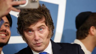 Argentina's President Javier Milei pose with students and to Yeshiva University President Rabbi Dr. Ari Berman on Monday, March 9, 2026 in New York. (AP Photo/Kena Betancur)