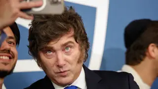 US Argentina Milei Argentina's President Javier Milei pose with students and to Yeshiva University President Rabbi Dr. Ari Berman on Monday, March 9, 2026 in New York. (AP Photo/Kena Betancur)