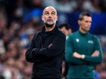 11 March 2026, Spain, Madrid: Manchester City manager Pep Guardiola looks on during the UEFA Champions League soccer match between Real Madrid and Manchester City at the Santiago Bernabeu. Photo: Bradley Collyer/PA Wire/dpa 11/03/2026 ONLY FOR USE IN SPAIN