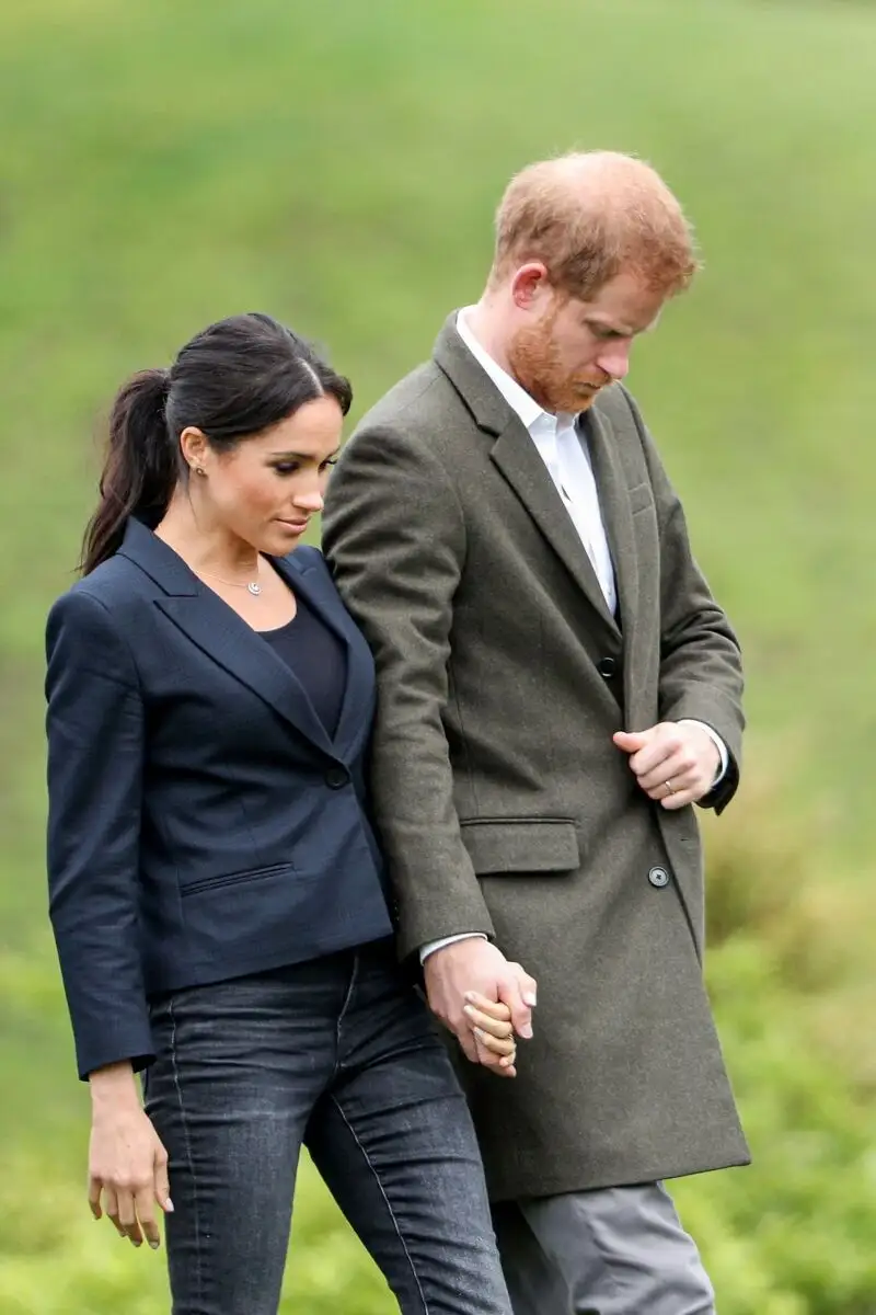 Britain's Prince Harry (R), The Duke of Sussex and his wife Meghan, Duchess of Sussex arrive to dedicate an area of native bush to the Queen's Commonwealth Canopy at Redvale, Auckland, New Zealand