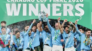 Britain League Cup Soccer Manchester City players celebrate with the trophy after winning the English League Cup final soccer match between Arsenal and Manchester City in London, Sunday, March 22, 2026. (AP Photo/Richard Pelham)