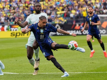 Brazil's Raphinha takes a shot during the international friendly soccer match between Brazil and France in Foxborough, Mass, Thursday, March 26, 2026. (AP Photo/Charles Krupa)