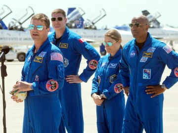 Artemis 2 crew members, from left; Commander Reid Wiseman, Mission Specialist Jeremy Hansen, of Canada, Mission Specialist Christina Koch, and Pilot Victor Glover speak to the media after the crew's arrival at the Kennedy Space Center Friday, March 27, 2026, in Cape Canaveral, Fla. (AP Photo/Chris O'Meara)