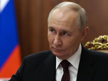 Russian President Vladimir Putin listens to governor of Arkhangelsk region Alexander Tsybulsky during their meeting at the Kremlin in Moscow, Monday, March 30, 2026. (Alexander Kazakov, Sputnik, Kremlin Pool Photo via AP)