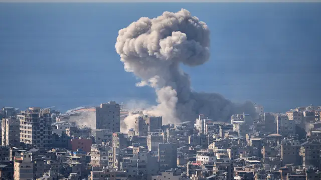 Climate Iran Desalination FILE - Smoke rises from an Israeli airstrike in Dahiyeh, Beirut's southern suburbs, March 9, 2026. (AP Photo/Hassan Ammar, File)