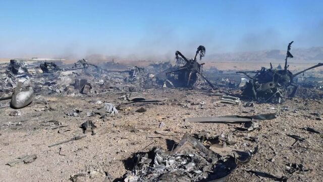 In this image provided by Sepahnews, the Iranian Revolutionary Guard's official website, wreckage is shown at what Iran's state TV claimed was the site of a downed American transport plane and two helicopters involved in a rescue operation, in Isfahan province, Iran, April, 2026. (Sepahnews via AP)