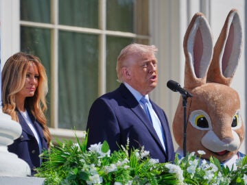 President Donald Trump and first lady Melania Trump participate in the White House Easter Egg Roll on the South Lawn of the White House, Monday, April 6, 2026, in Washington. (AP Photo/Mark Schiefelbein)
