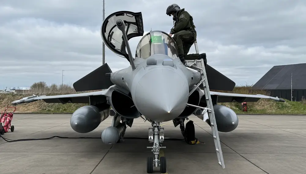 A French pilot climbs into a Rafale fighter jet at Leeuwarden airbase in the Netherlands during the NATO exercise "Ramstein Flag 25"