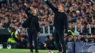 Barcelona's head coach Hansi Flick, right, and Atletico Madrid's head coach Diego Simeone react during the Champions League quarterfinal first leg soccer match between Barcelona and Atletico Madrid in Barcelona, Spain, Wednesday, April 8, 2026. (AP Photo/Joan Monfort)