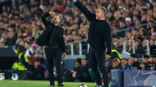 Spain Champions League Soccer Barcelona's head coach Hansi Flick, right, and Atletico Madrid's head coach Diego Simeone react during the Champions League quarterfinal first leg soccer match between Barcelona and Atletico Madrid in Barcelona, Spain, Wednesday, April 8, 2026. (AP Photo/Joan Monfort)