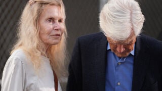 Suzanne Morrison, mother of Matthew Perry, walks into court with her husband Keith Morrison before Jasveen Sangha, who plead guilty to selling Perry a lethal dose of the drug ketamine in the days before his death, appears in court for sentencing on Wednesday, April 8, 2026 in Los Angeles. (AP Photo/Damian Dovarganes)