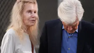 Matthew Perry Suzanne Morrison, mother of Matthew Perry, walks into court with her husband Keith Morrison before Jasveen Sangha, who plead guilty to selling Perry a lethal dose of the drug ketamine in the days before his death, appears in court for sentencing on Wednesday, April 8, 2026 in Los Angeles. (AP Photo/Damian Dovarganes)