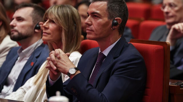 Spain's Prime Minister Pedro Sanchez and his wife Begona Gomez attend a speech at Tsinghua University in Beijing, China, Monday April 13, 2026. (Andres Martinez Casares/Pool Photo via AP)