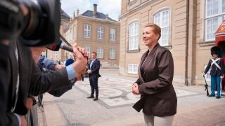 Acting Prime Minister Mette Frederiksen talks to the media after her visit to the King at Amalienborg Palace in Copenhagen, Denmark, Saturday, May 23, 2026. (Emil Helms/Ritzau Scanpix via AP)