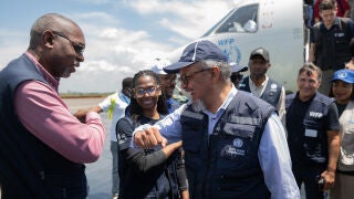Director General of the World Health Organisation (WHO) Tedros Adhanom Ghebreyesus, right, is welcomed at Bunia airport in Bunia, Congo, Saturday, May 30, 2026. (AP Photo/Moses Sawasawa)
