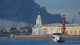 A plumes of black smoke is seen over the port of St. Petersburg, Russia, Wednesday, June 3, 2026, after a Ukrainian drone attack. (AP Photo)