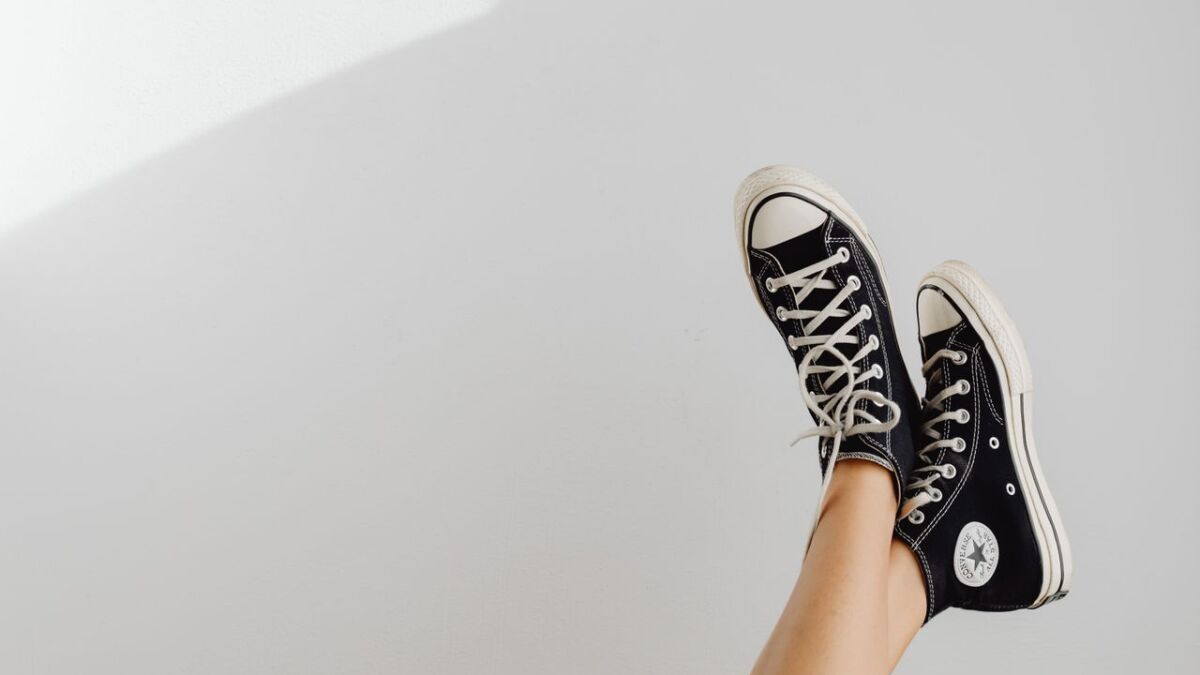 Children wearing adult shoes are rehearsing grown-up life