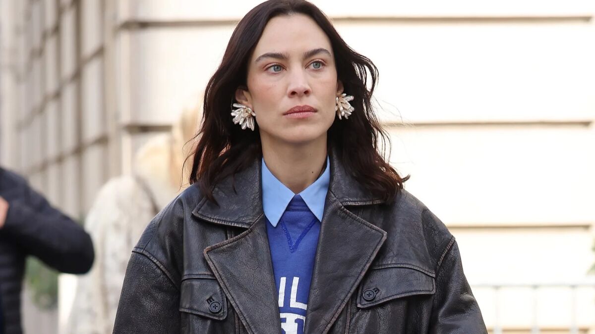 Alexa Chung styles camouflage cargo trousers in Paris