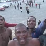 Inmigrantes tras saltar la valla de Ceuta