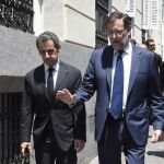 El expresidente francés Nicolas Sarkozy y el presidente del Gobierno, Mariano Rajoy