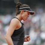 Garbiñee Muguruza celebra su victoria ante Maria Sharapova. (AP Photo/Thibault Camus)