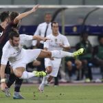 El centrocampista galés del Real Madrid, Gareth Bale (2i) durante el partido amistoso ante el AC Milán que ambos equipos disputaron en Shanghai, China el 30 de julio