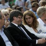 El expresidente de la Generalitat, Carles Puigdemont y Marta Pascal en una imagen de archivo.