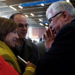 La expresidenta del Parlament, Carme Forcadell, junto a Agustí Alcoberro, de la ANC, y Jordi Turull, asisten a la Asamblea General de la ANC/Efe